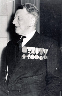 Photograph of Knight later in life wearing his medals